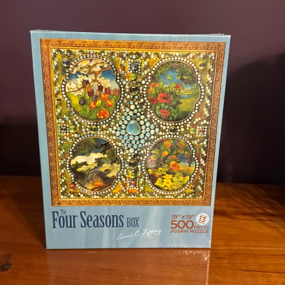 New in box Louis Tiffany art puzzle.